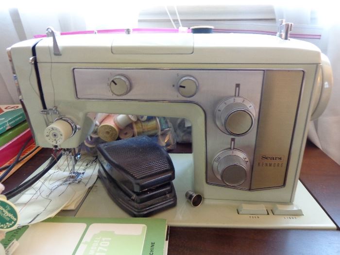Sears Kenmore ZigZag sewing machine in table. 
