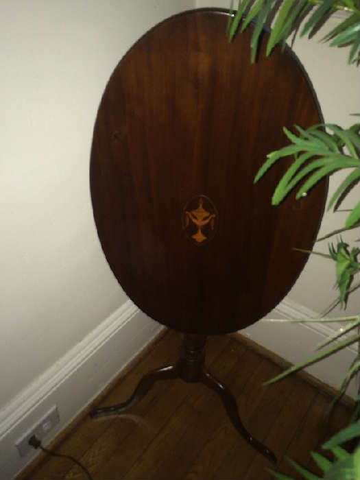 Inlaid mahogany, reproduction tilt top table
