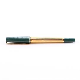 S.T. Dupont 18k Gold Nib Fountain Pen: An 18k gold nib fountain pen by S.T. Dupont. The pen features a gold plate body and clip, with a dark forest green cap. The pen point is marked with “18ct” and “750”.