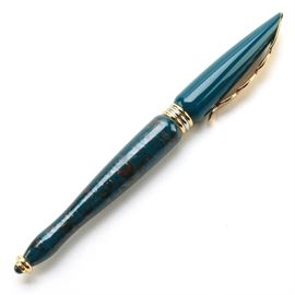 Yafa Blue and Gold Ballpoint Body: A Yafa ballpoint body. This pen writes blue and is capped with gold tone accents to the clip. The pen body shows a marble patterned frame and is marked with “Yafa”.