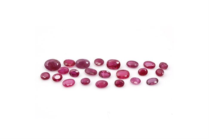 7.85 CTW of Rubies: A collection of loose faceted oval cut rubies.