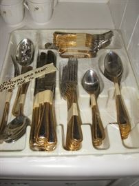 Wallace "Continental" gold bead flatware service for 16 and 10 serving pieces. 