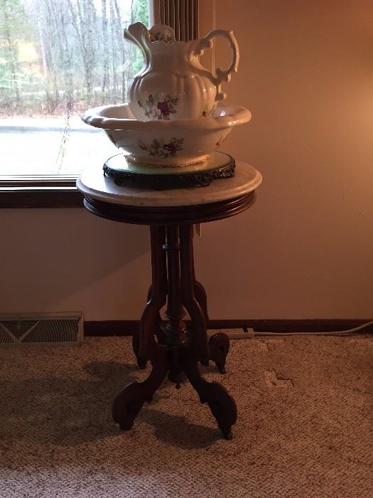 marble top table and bowl and pitcher