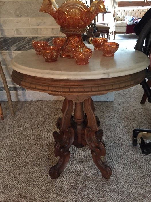 Victorian marble top table with carnival glass punch bowl set