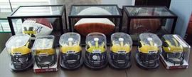 Collection of Autographed U of M Coaches,  Team Signed Balls and Helmets