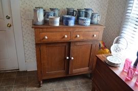 American Primitive Kitchen Cabinet with 2 drawers and double doors.