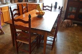 American Primitive Farmhouse Kitchen Table ( Original as is every piece of furniture in this Historic House ) - also - a set of six original Ladder Back Chairs with Rush Seats in excellent condition!