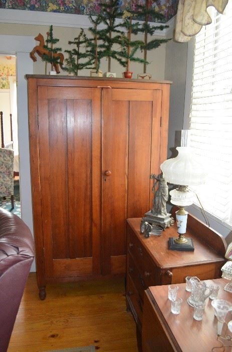 Another View of the Antique Double Door Wardrobe notice the Feathered German Christmas Tree Set of 7 ranging in size from approx. 8" up to 42".