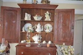American Primitive Hutch with double doors, drawer and display shelves with Oil Lamps, Fitz & Floyd, Display Plates and more!