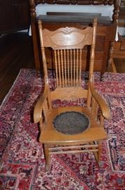 Turn of the 19th Century American Oak Press Back/Spindle Back Rocker with Leather Seat bottom