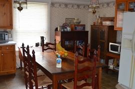 View of Kitchen with Gorgeous Farm House Table matching Ladder Back Rush Seated Chairs, Pie Safe and Kitchen Cabinet