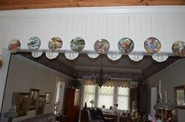 Lots of Collectible Plates on both sides of the Ceiling Beam