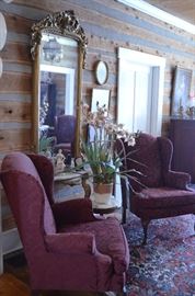 The Ambience is Stunning!!! Featured here is an Antique Rocco Wall Mirror with Marble Top Table Base * Also * A pair of Antique Wing Back Chairs 