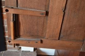 American Primitive Hand Crafted Wardrobe just notice the intricate carving that went into just the locking system