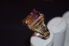 #4. Brilliant Multi-Stone Ring Ladies 14k yellow gold Rectangle Shape Ring Mounting weighing approx. 9.97dwt and is set in center with one Emerald Cut Amatrine measuring approx. 18.25mm in length by approx. 13mm in width by approx. 9.7mm in depth and weighs approx. 15.30ct. The Gorgeous Ring is set with 4 Round Cut Blue Sapphires, 4 Round Cut Yellow Sapphires, and 4 Round Brilliant Cut Diamonds. The Diamonds measure approx.2.1mm in diameter and each weigh approx. 03/100ct. The color is SI(2) - I(1)