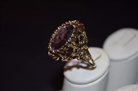 #5. Lovely Victorian Style Amethyst Ring Ladies 14k yellow gold Oval Ring Mounting weighing approx. 8.22dwt and is set with One Oval Cut Amethyst measuring approx. 17.8mm in length by approx. 13.3mm in width by approx. 9.3mm in depth and weighs approx. 10.67ct.