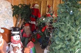 Notice the Very Large Santa, Lighted Palm Trees Christmas Trees and Piles of Yard Lighting Displays, Christmas Items Galore!!!!