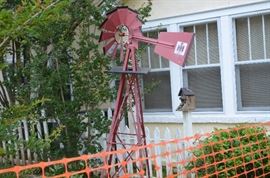 International Harvester Windmill in very good shape, it is not crooked the ground is simply soft where it is standing