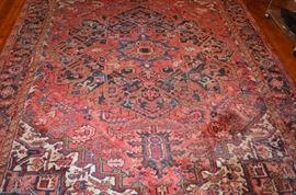 Another Gorgeous Antique Rug in the Historic Home. There are 3 9' x 12' Bakhtiari Rugs all with cloth tags made in Iran and one smaller Bakhtiari approx. 3' x 9'.