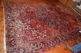 Another Gorgeous Antique Rug in the Historic Home. There are 3 9' x 12' Bakhtiari Rugs all with cloth tags made in Iran and one smaller Bakhtiari approx. 3' x 9'.