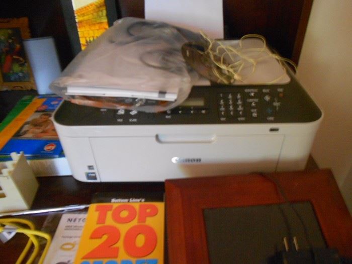 Two computers, desk and printer