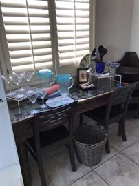 This table is not for sale. Chairs, basket and all other items in pic are for sale.