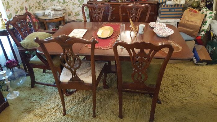 5 Chippindale Style Dinning Chairs.  4 original chairs are matching,  one was added .
