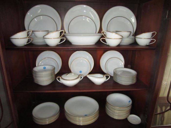 Noritake China-white with gold trim. Service for 10-12, some pieces are missing. 