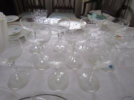 Lots of crystal stemware- champagnes, wines, waters, sherries...