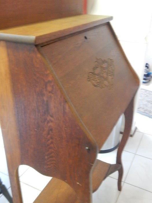 Antique drop leaf desk with key.