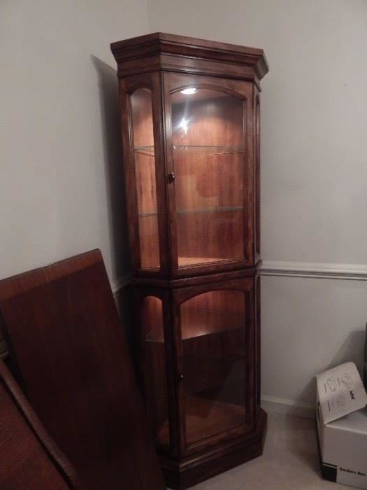 Nice size corner cabinet with lighting.