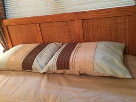 This bedroom set features a great rattan design