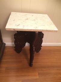 Marble top tables (several).