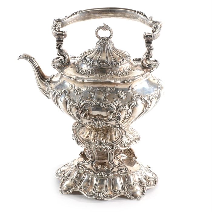 Sterling Silver Gorham "Chantilly" Teapot on a Warming Stand: A sterling silver Gorham Chantilly teapot on a warming stand. This teapot has a Rococo styling with Art Nouveau influence with a swag and foliate design. Gorham maker mark, “Sterling A601 3 7/8 pint” to the backside. Total approximate weight is 67.245 ozt.