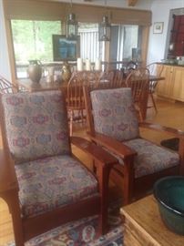 Pair cherry Stickley branded chairs with original cushions.