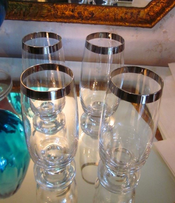 Mid century modern, silver rimmed glasses, Dorothy Thorpe style.