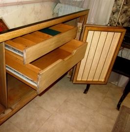 Mid century, solid walnut side board: Formica/laminate door inserts, shelves and drawers behind two triple bi-fold doors, custom beveled mirror top.  78" w, 18"d, 33" h