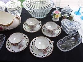 Cut crystal, vintage opalescent teacups with pierced edge saucers, and misc.