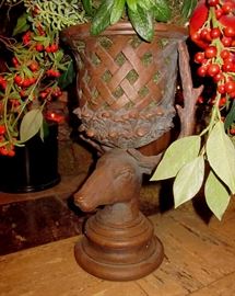 Fruit and foliage decoration in deer head planter, 39" tall.