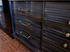 Mid century modern triple dresser, 9 drawers with black/grayish finish (not original) with custom glass top.  61" wide, 19-1/2" deep, 32" tall.