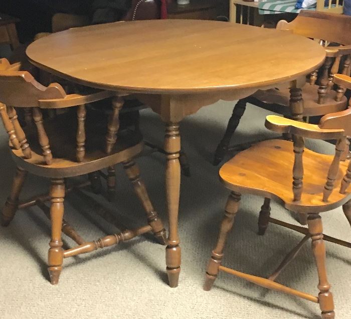 Wood table with 4 captains chairs