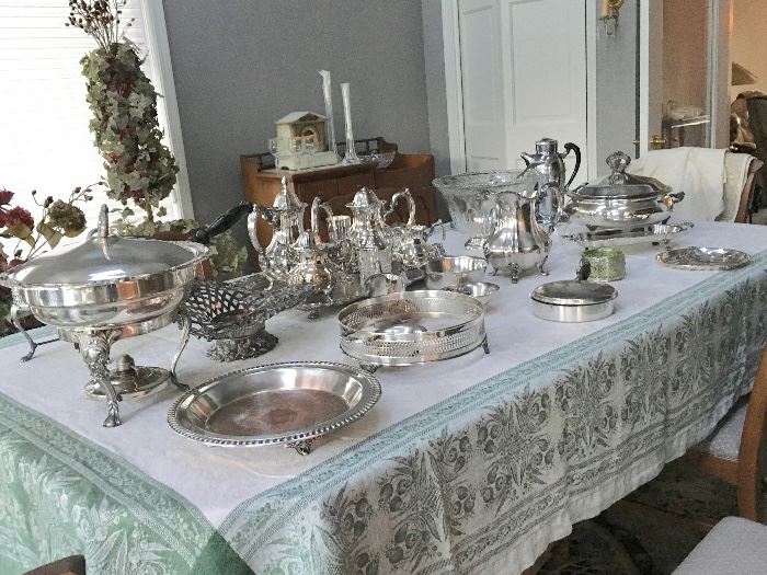 assorted silver serving pieces