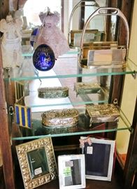 Top Shelf: Hermes, Paris Silverplate Stirrup Wallet / Letter Caddy; 2 Sterling Boxes & a Sterling-Enamel Photo Frame; Buccelati, Cartier & Tiffany Sterling Picture Frames