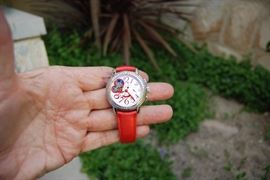 10. ZENITH QUEEN OF LOVE EL PRIMERO SS WITH DIAMOND BEZEL LADIES WATCH W/RED STRAP - ORIG COST: $11.3K - ASKING: $6750