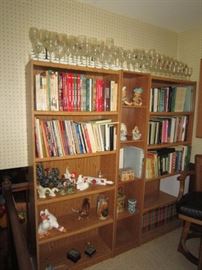 Lots of cookbooks, souvenir glasses