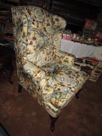 Wing chair with quilted pheasant pattern