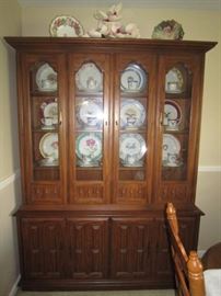 China cabinet filled with Woodmere Presidential place settings