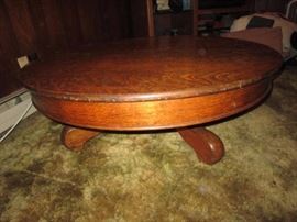 Low round oak coffee table-has optional smoked glass top