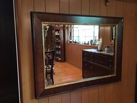 Over Size Modern Wall Mirror beside Dinning Table