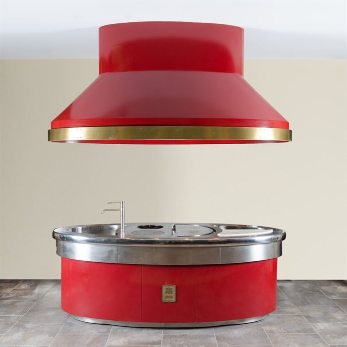 Impressive Custom-Made Molteni Stove, in Red Enamel: A quintessential and luxe modern oval-shaped Molteni custom-made “elliptical Podium” stove with hood. Touted as makers of opulent and professional kitchens, stove and ranges, the brand has been revered by master chefs since 1923. The bright red enamel, stainless steel stove features a very large preparation space with a sink with faucet at one end and well at the other which are on either side of a half-circle shaped steel French flat top, Schott Ceran ceramic-glass flat top burner and Schott Ceran ceramic-glass Wok burner and four storage drawers. The lighted hood features brass trim as well. Please visit the company website here for additional details.